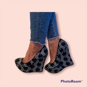 Alexandre Birman black platform wedge pumps. Silver metallic detailing.